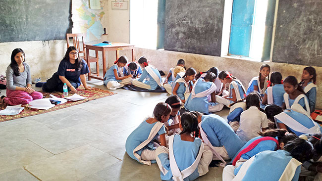 Maria Bohri in a classroom in India of 20 young girls