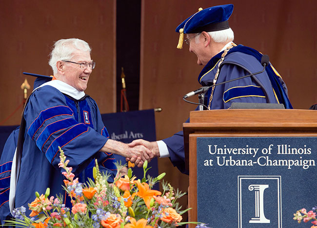 University of Illinois President Robert Easter presenting Doctorate degree to Tim Nugent